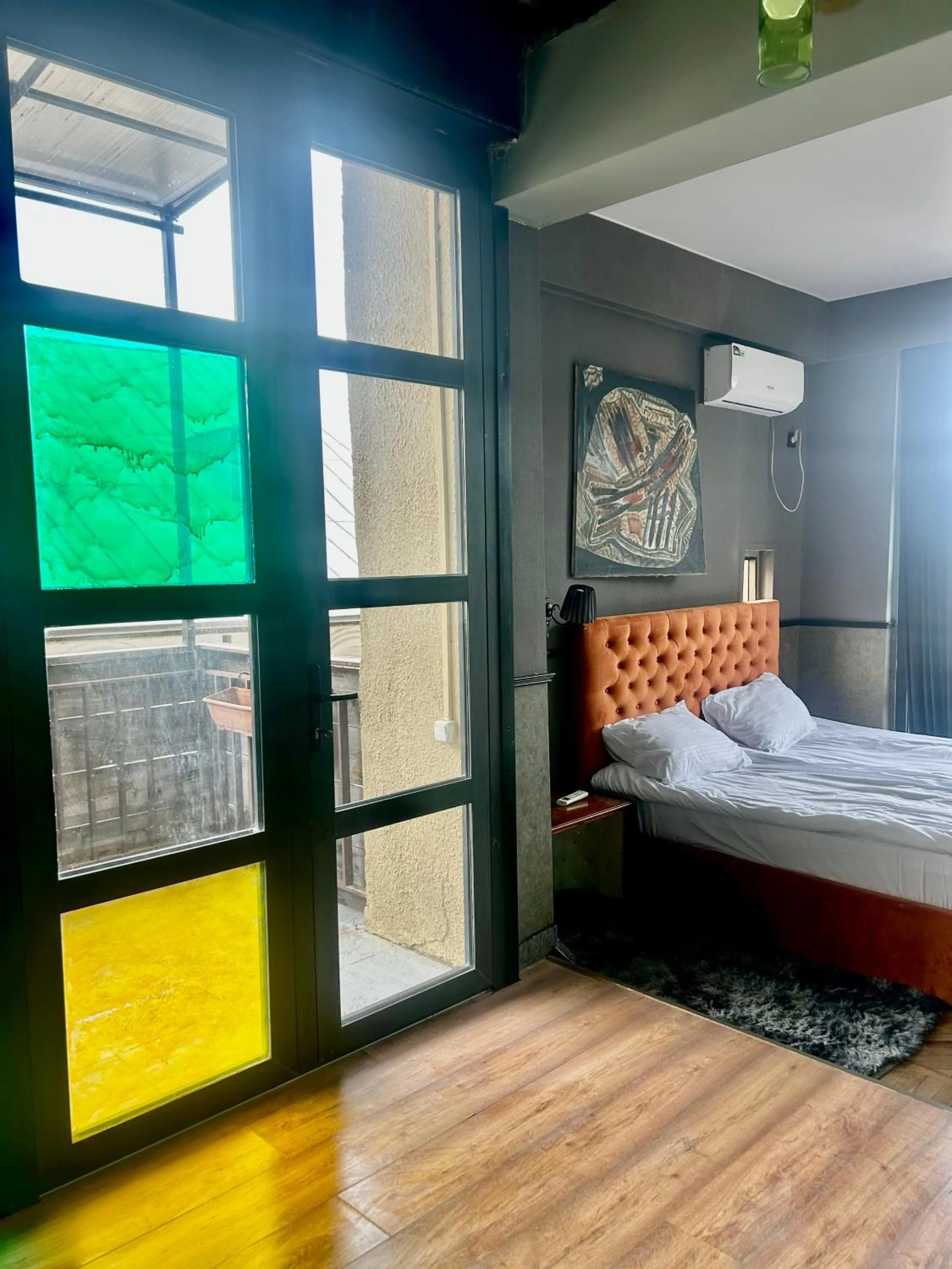 Bed in Art Hotel Home
