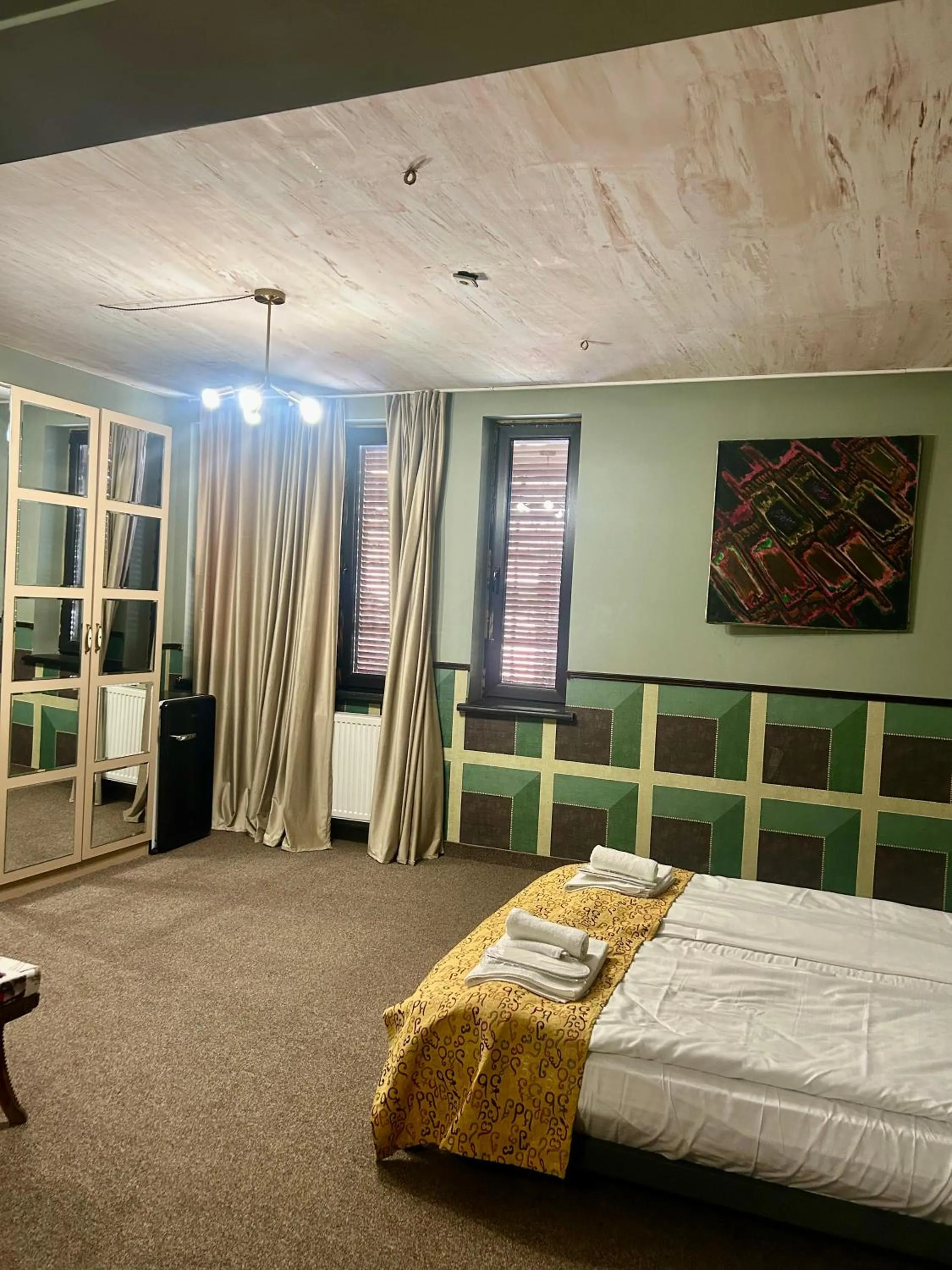 Bed in Art Hotel Home