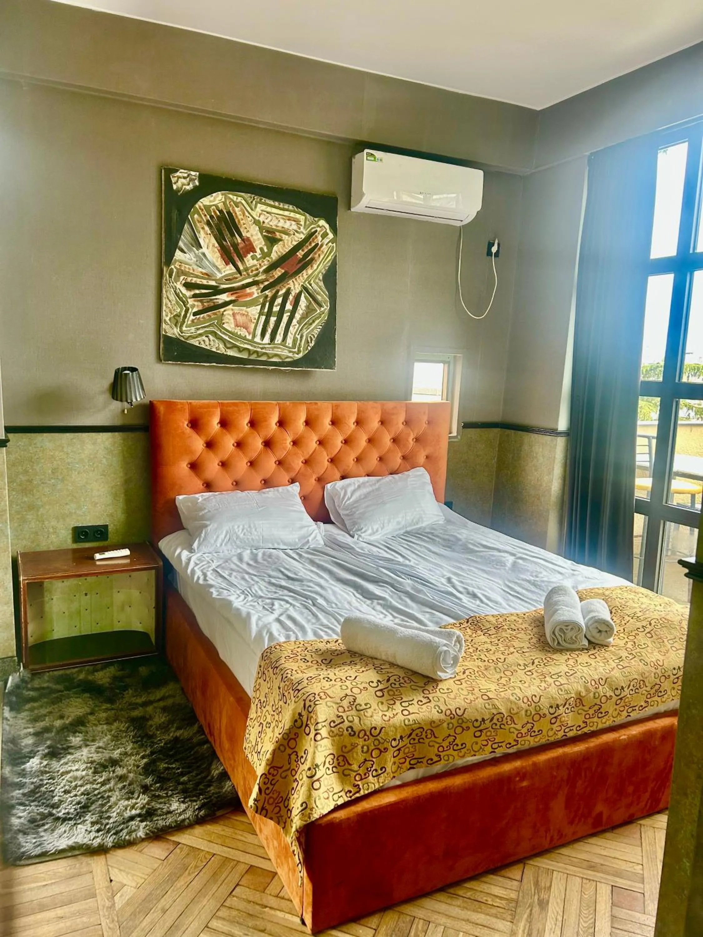 Bed in Art Hotel Home