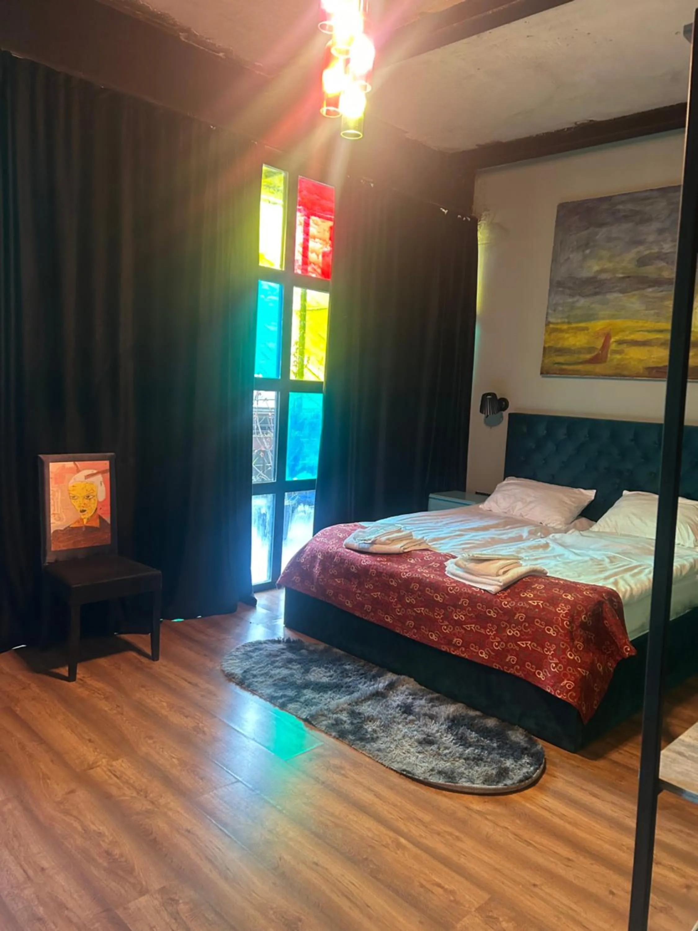 Bed in Art Hotel Home