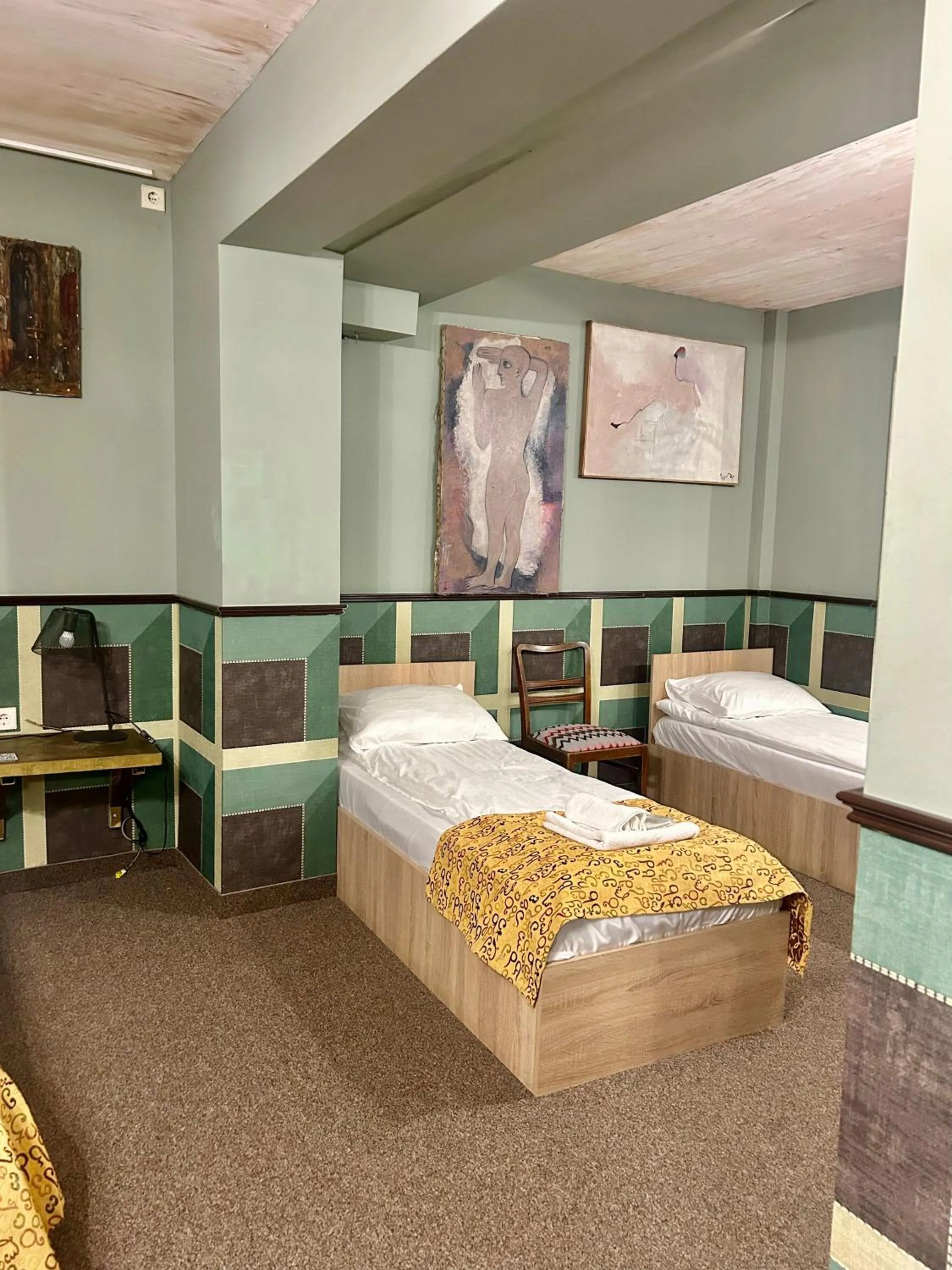 Bed in Art Hotel Home