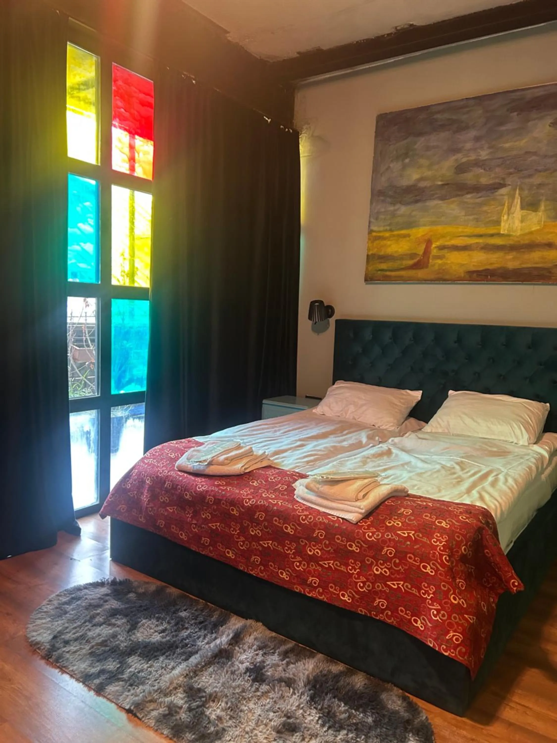Bed in Art Hotel Home