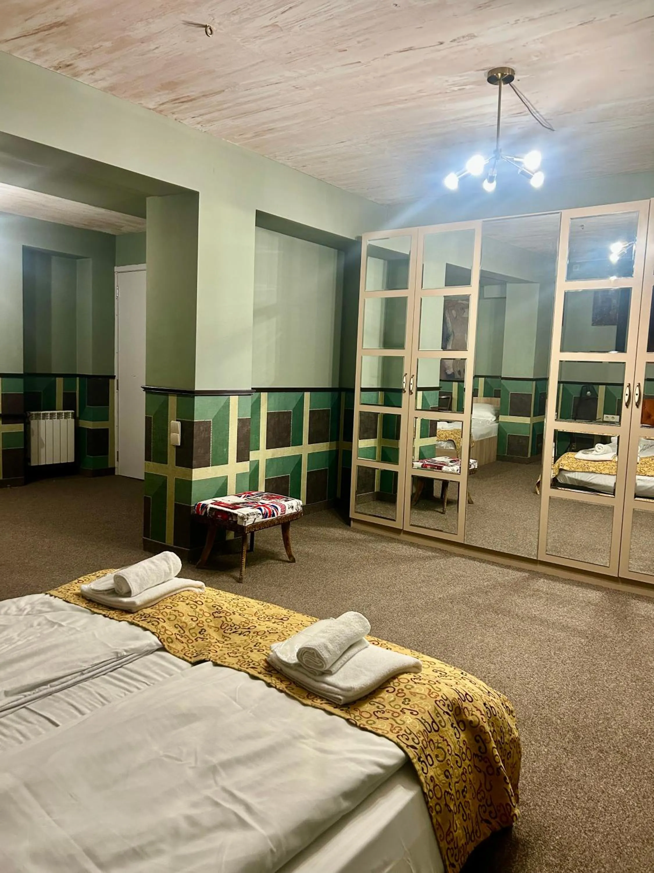 Bed in Art Hotel Home