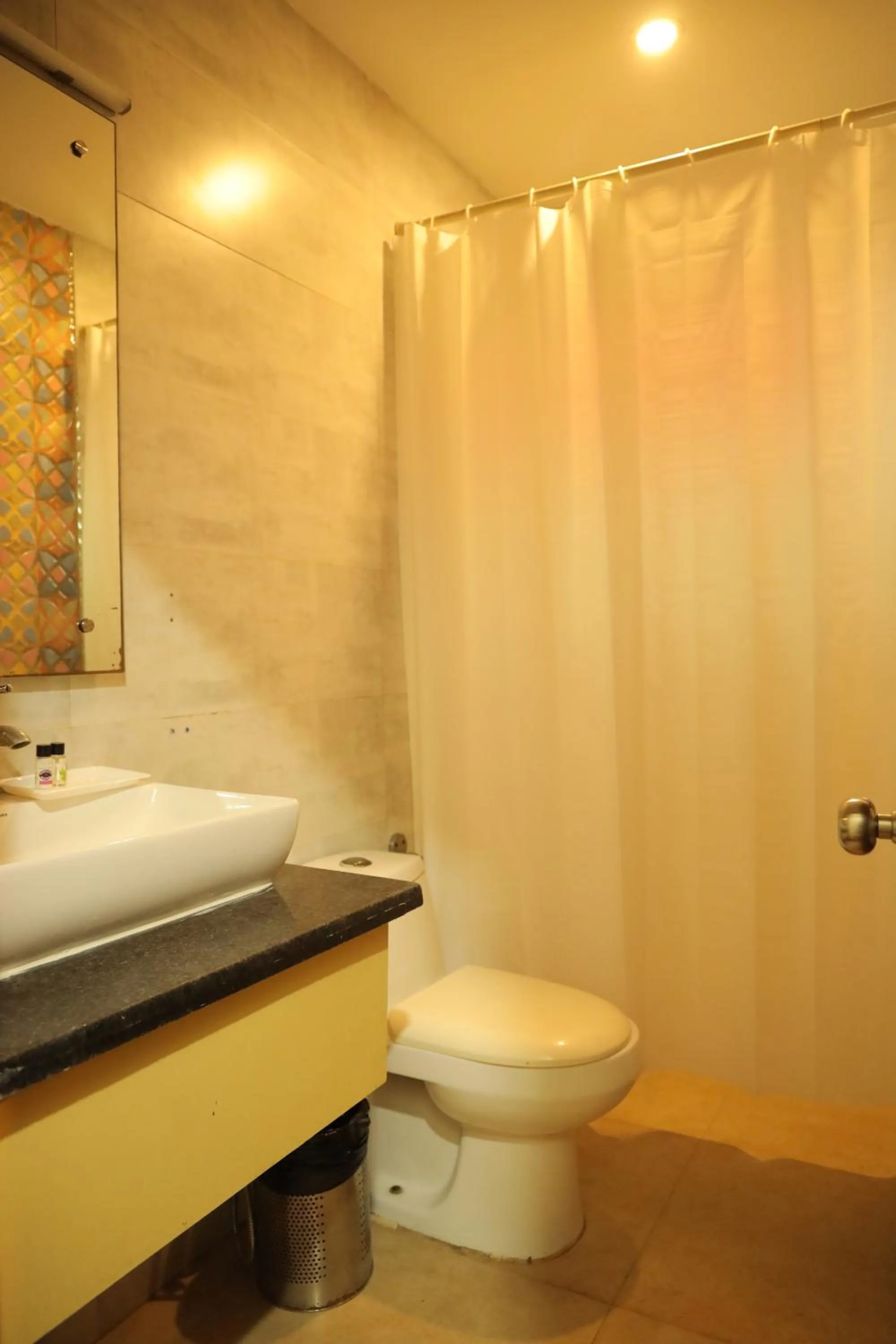 Bathroom in Hotel Nirvana Suites