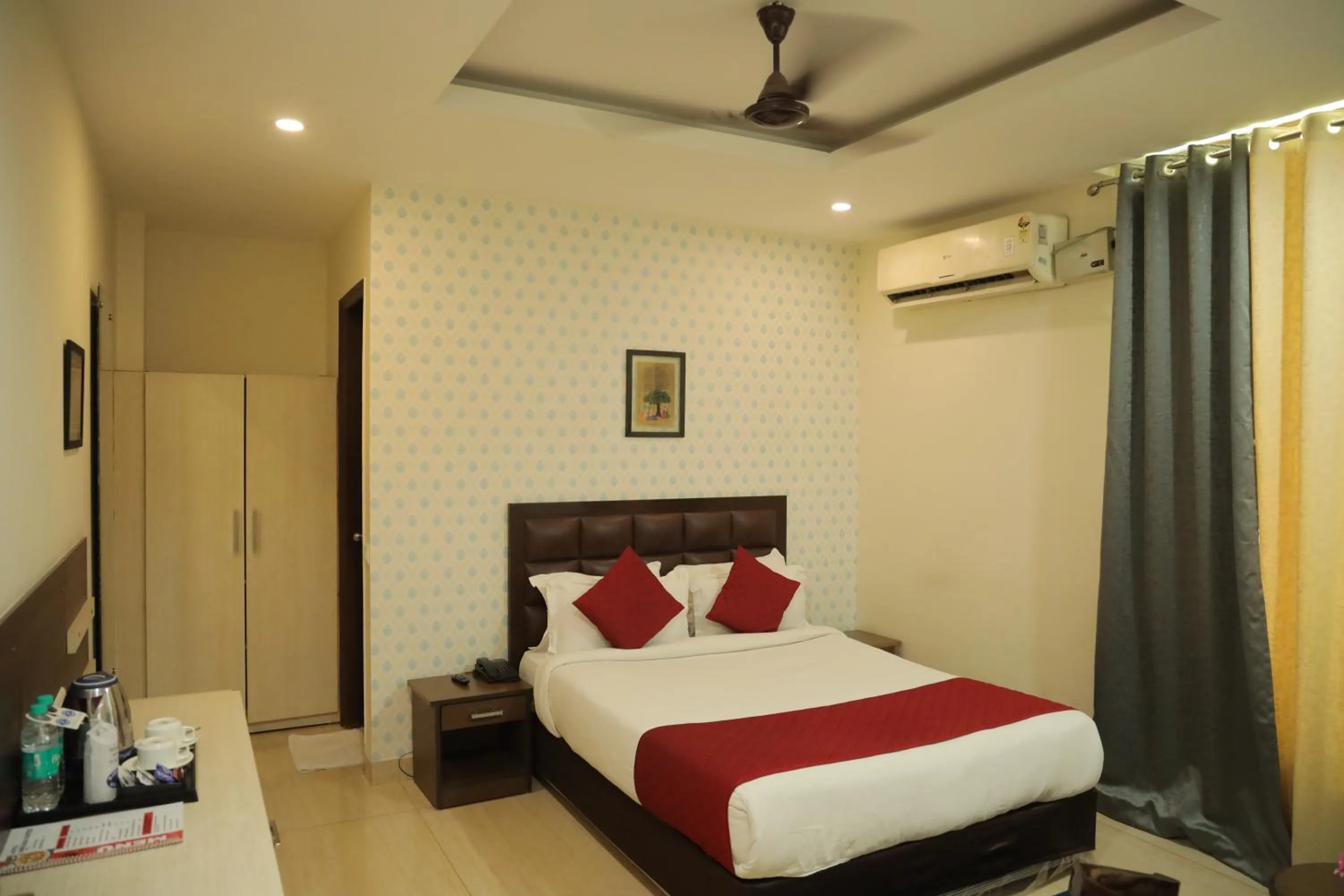 Bed in Hotel Nirvana Suites