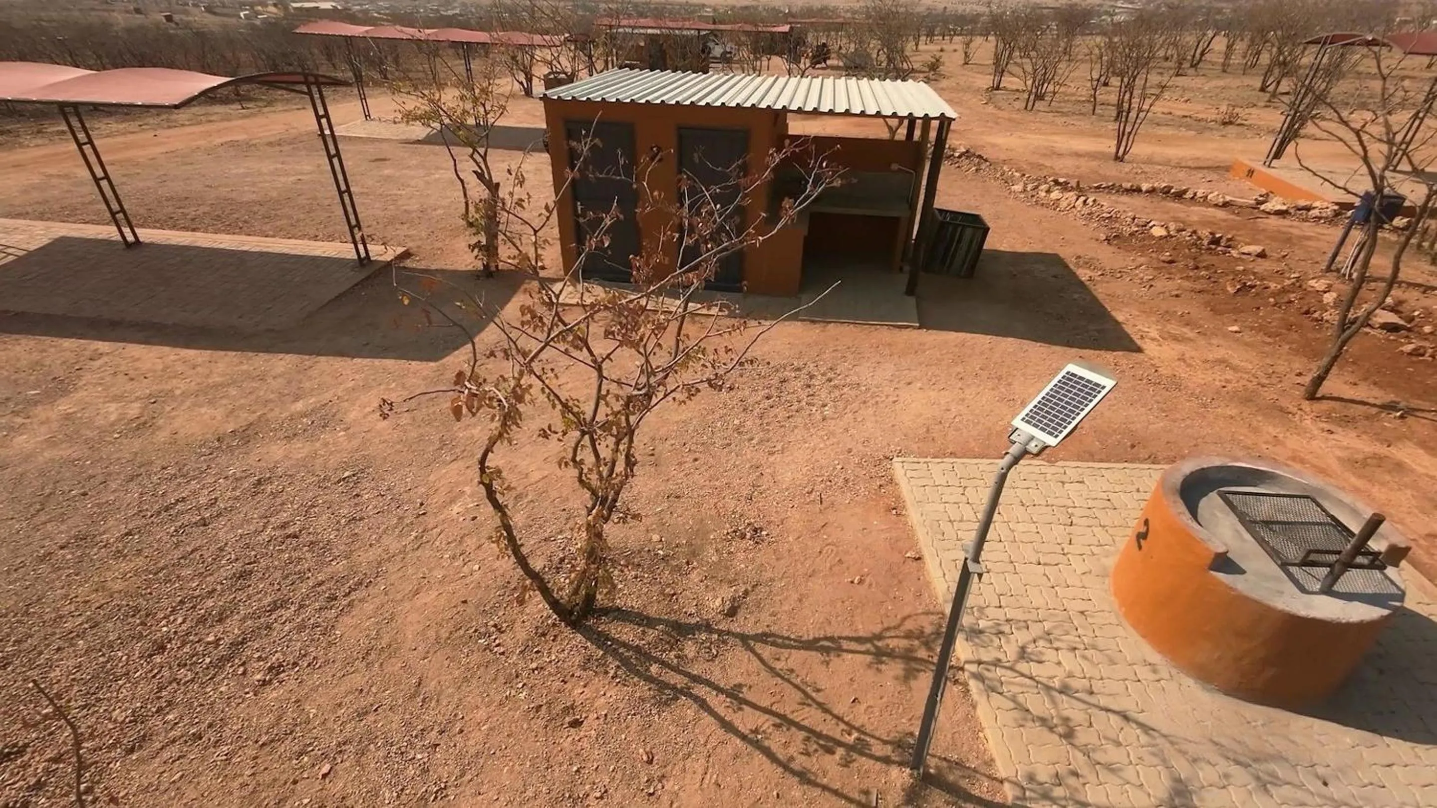 Text overlay in Opuwo Country Lodge Campsite