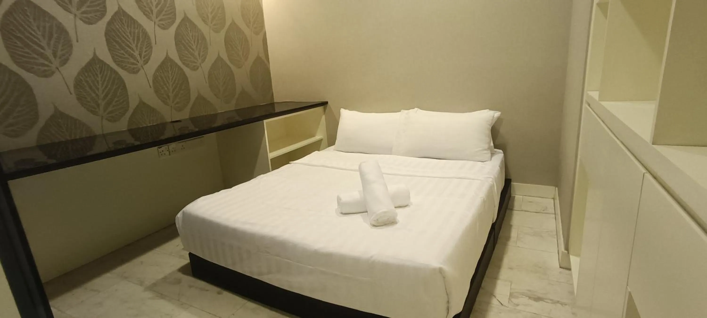 Bed in SKYWARD SUITES at Platinum KLCC