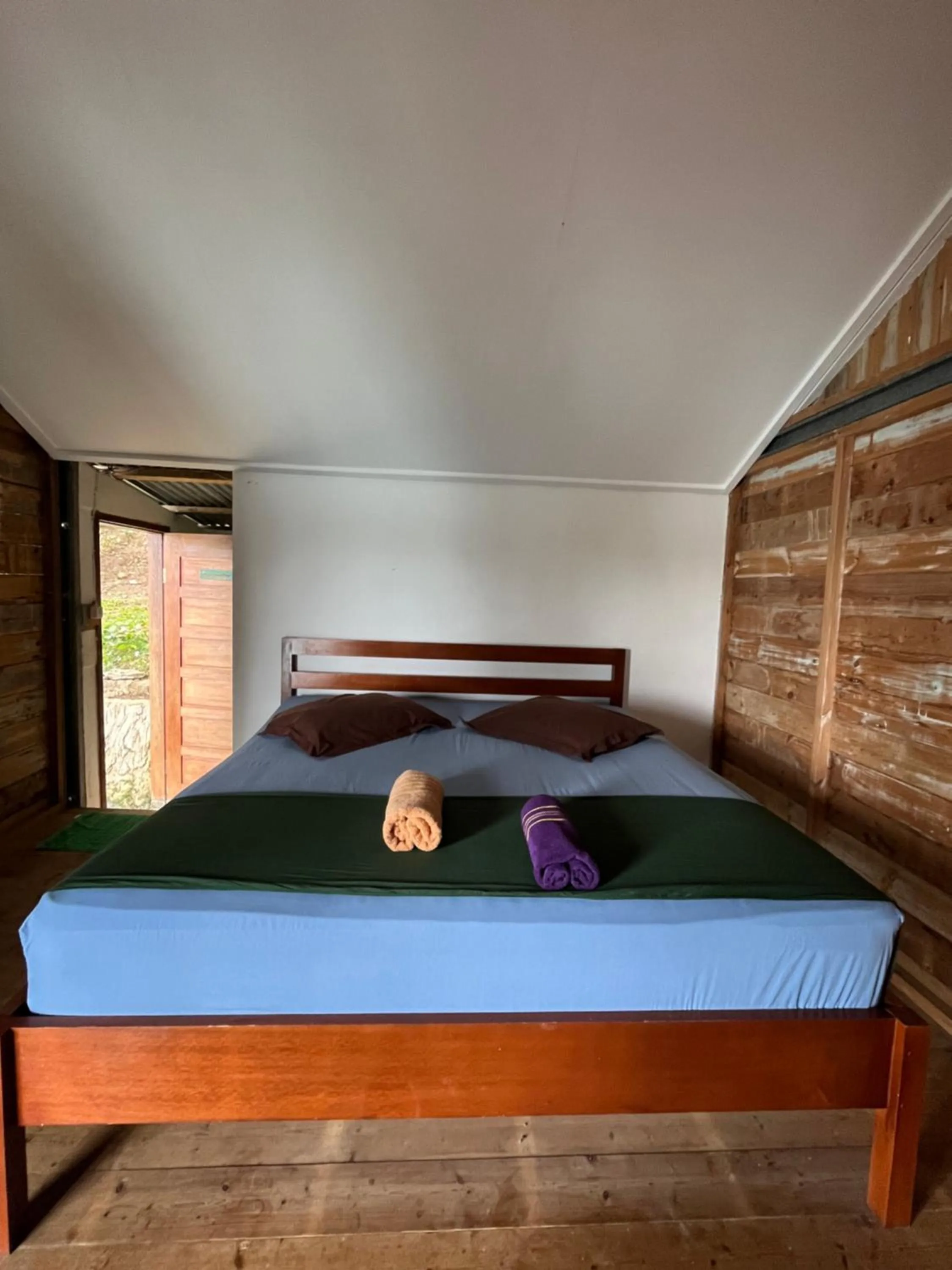Bed in Olala Bungalows and Restaurant