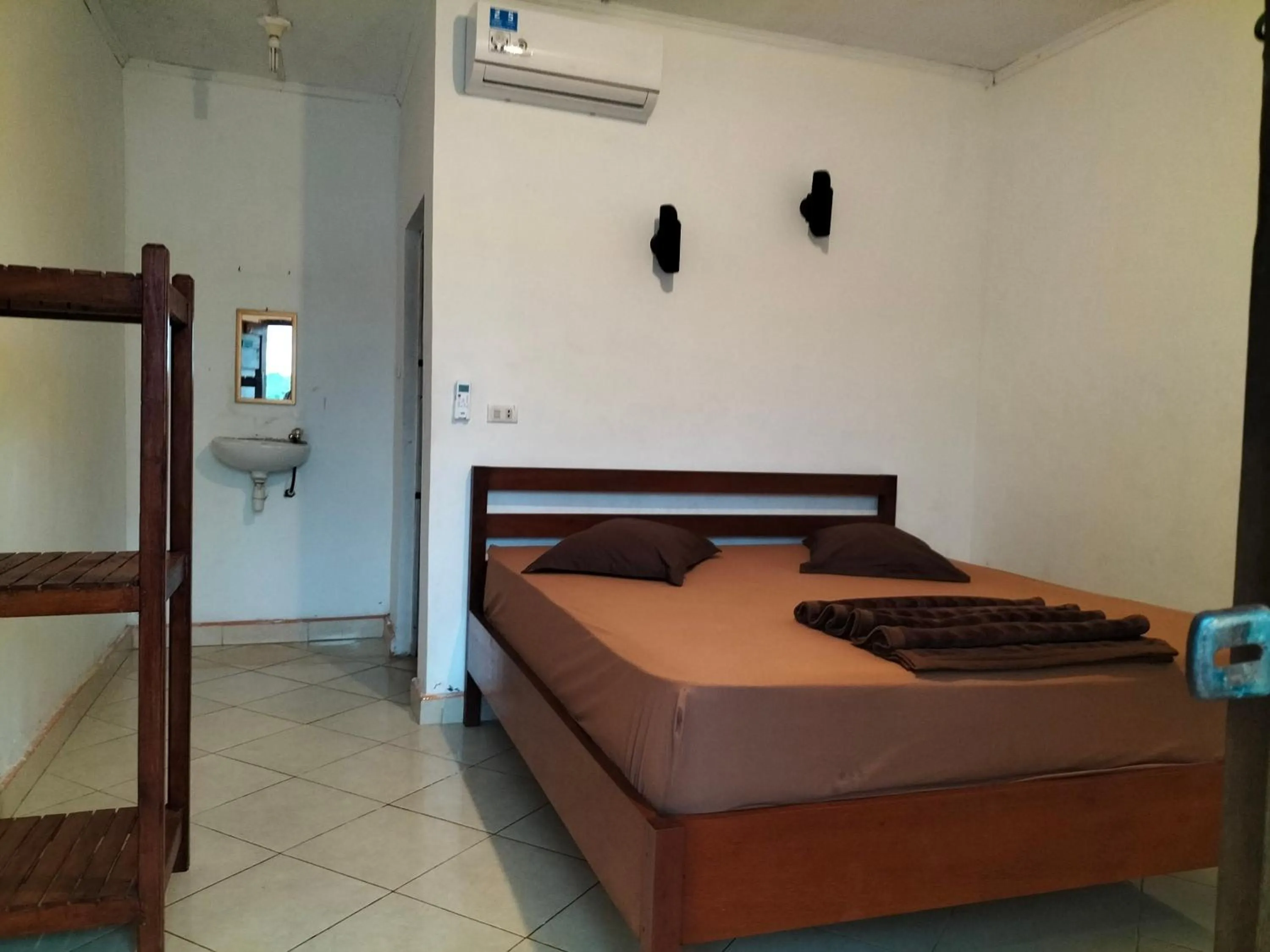 Bed in Olala Bungalows and Restaurant