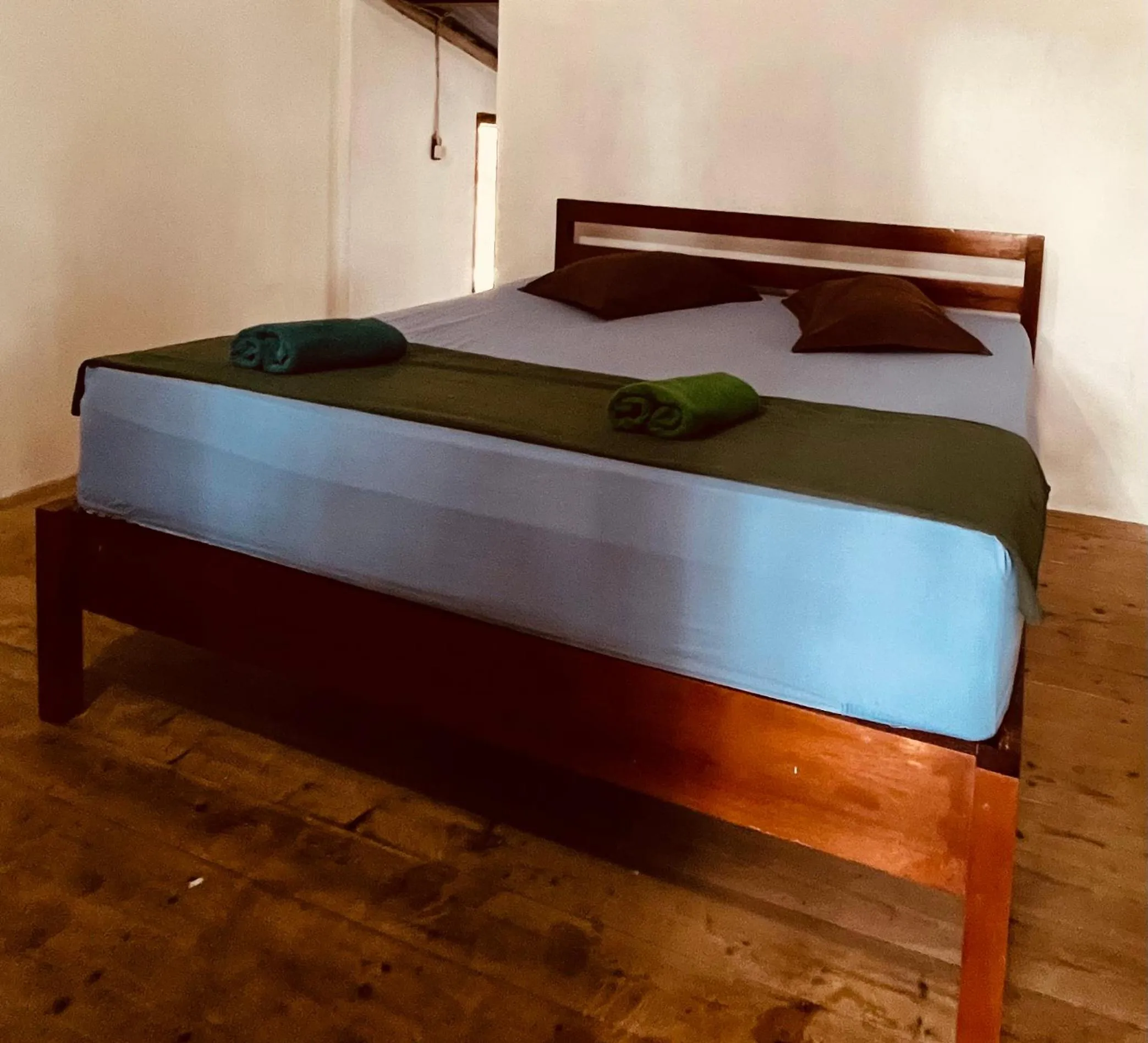 Bed in Olala Bungalows and Restaurant