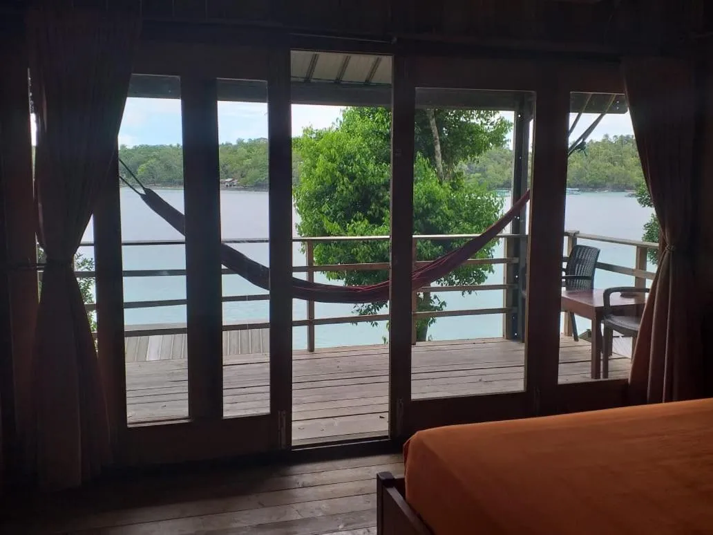 Bed in Olala Bungalows and Restaurant