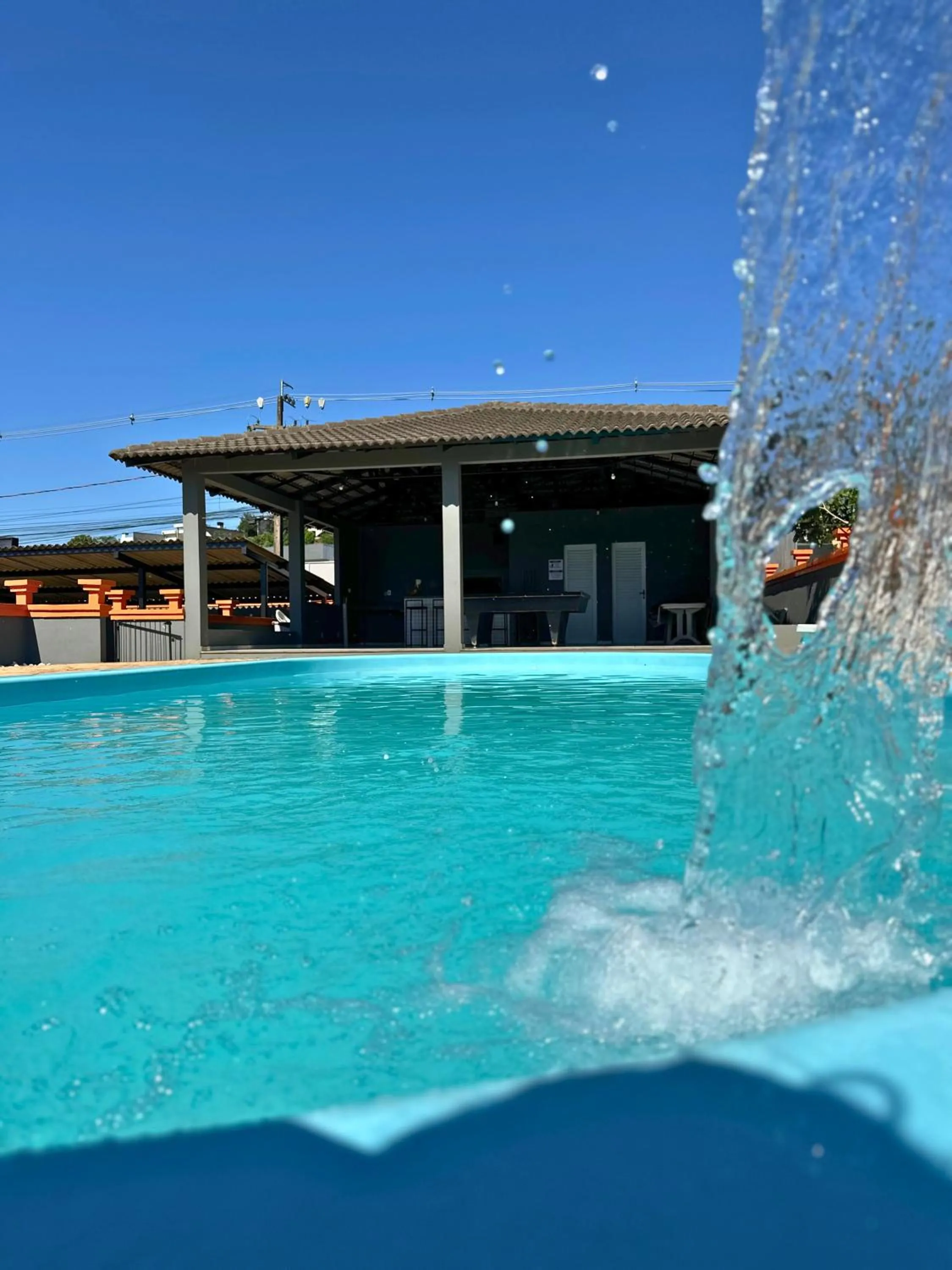 Swimming pool in PORTAL PARQUE HOTEL