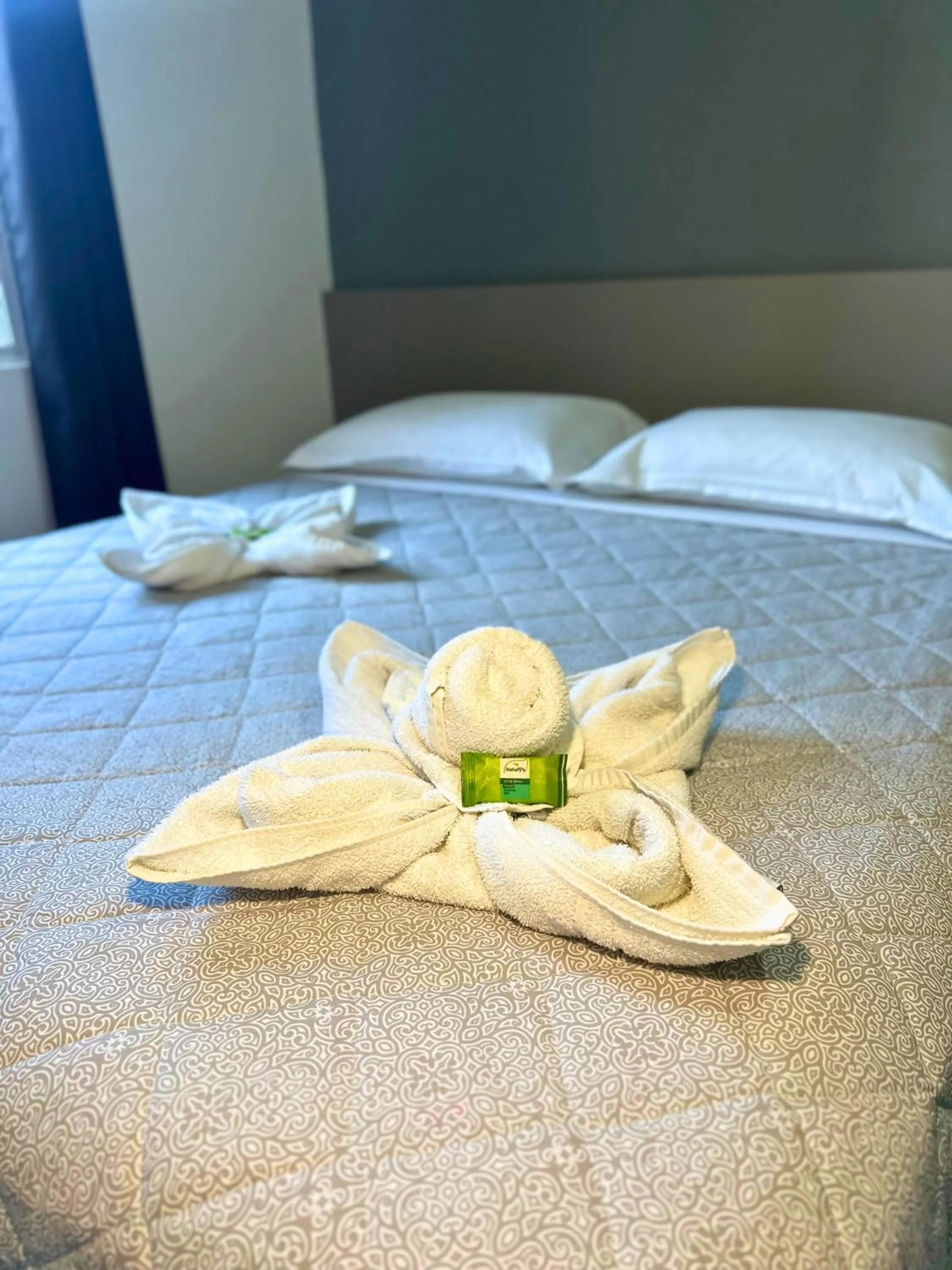 Bed in PORTAL PARQUE HOTEL
