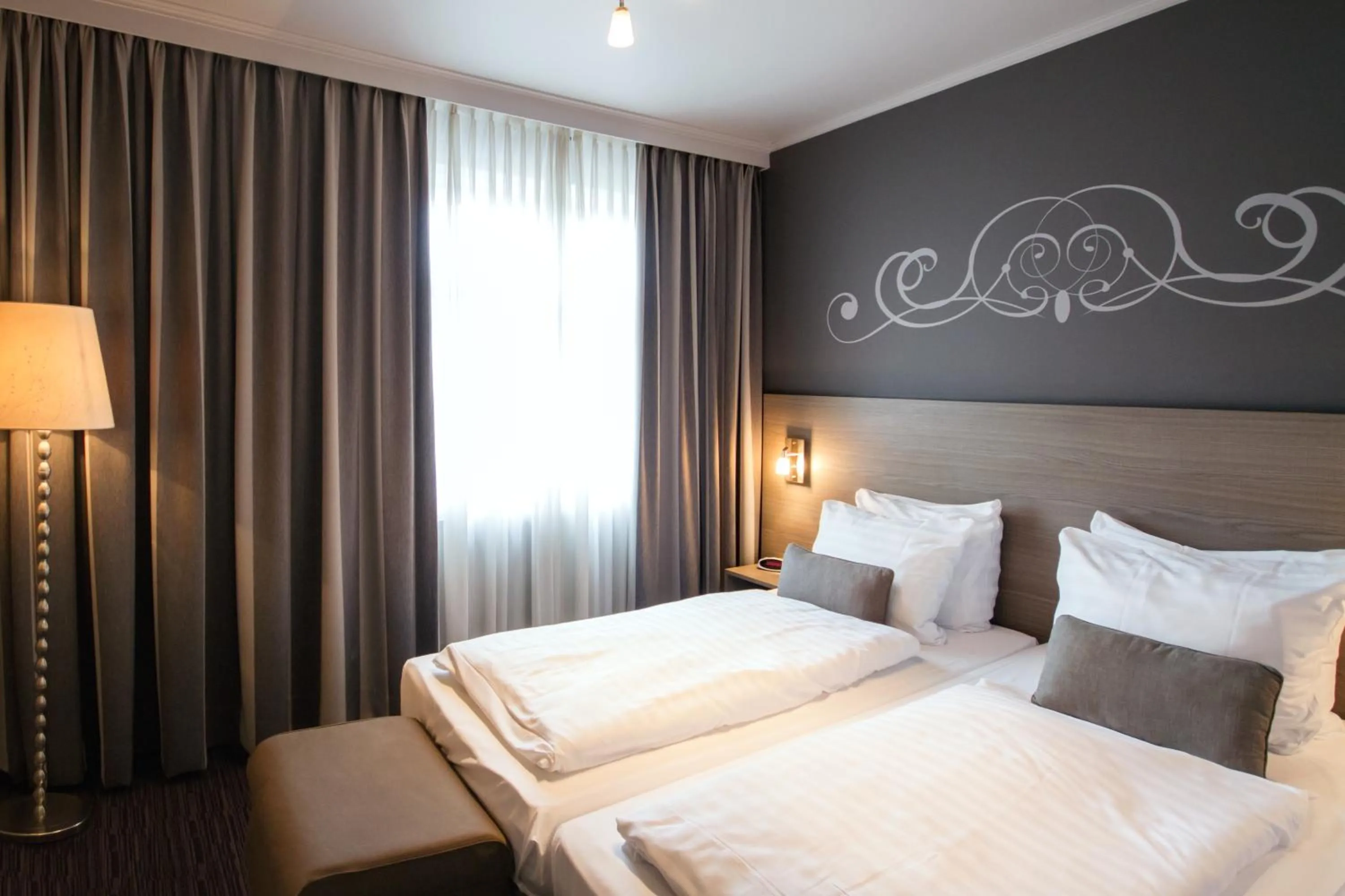 Bed in Grand Hotel Monopole