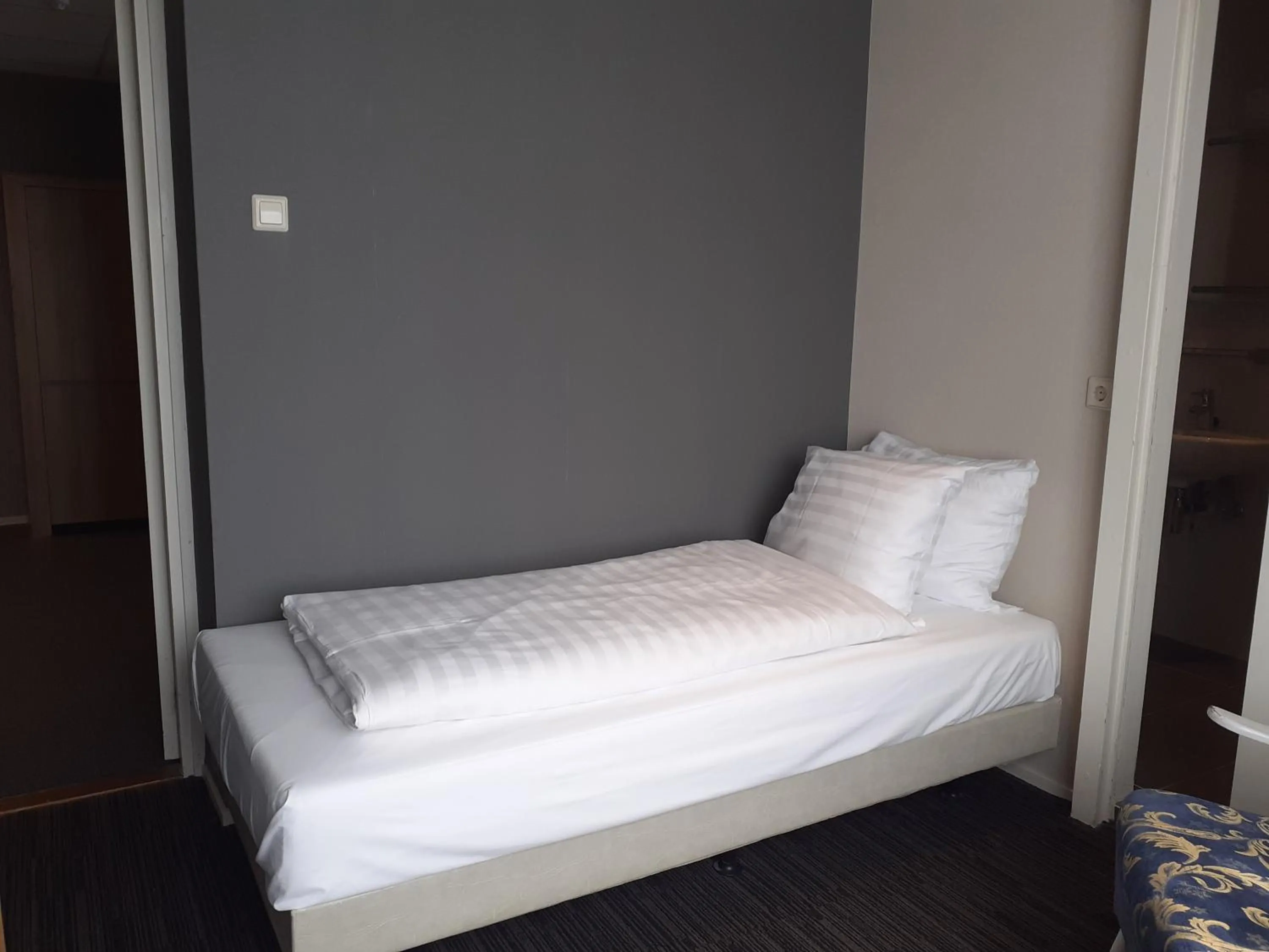 Bed in Grand Hotel Monopole