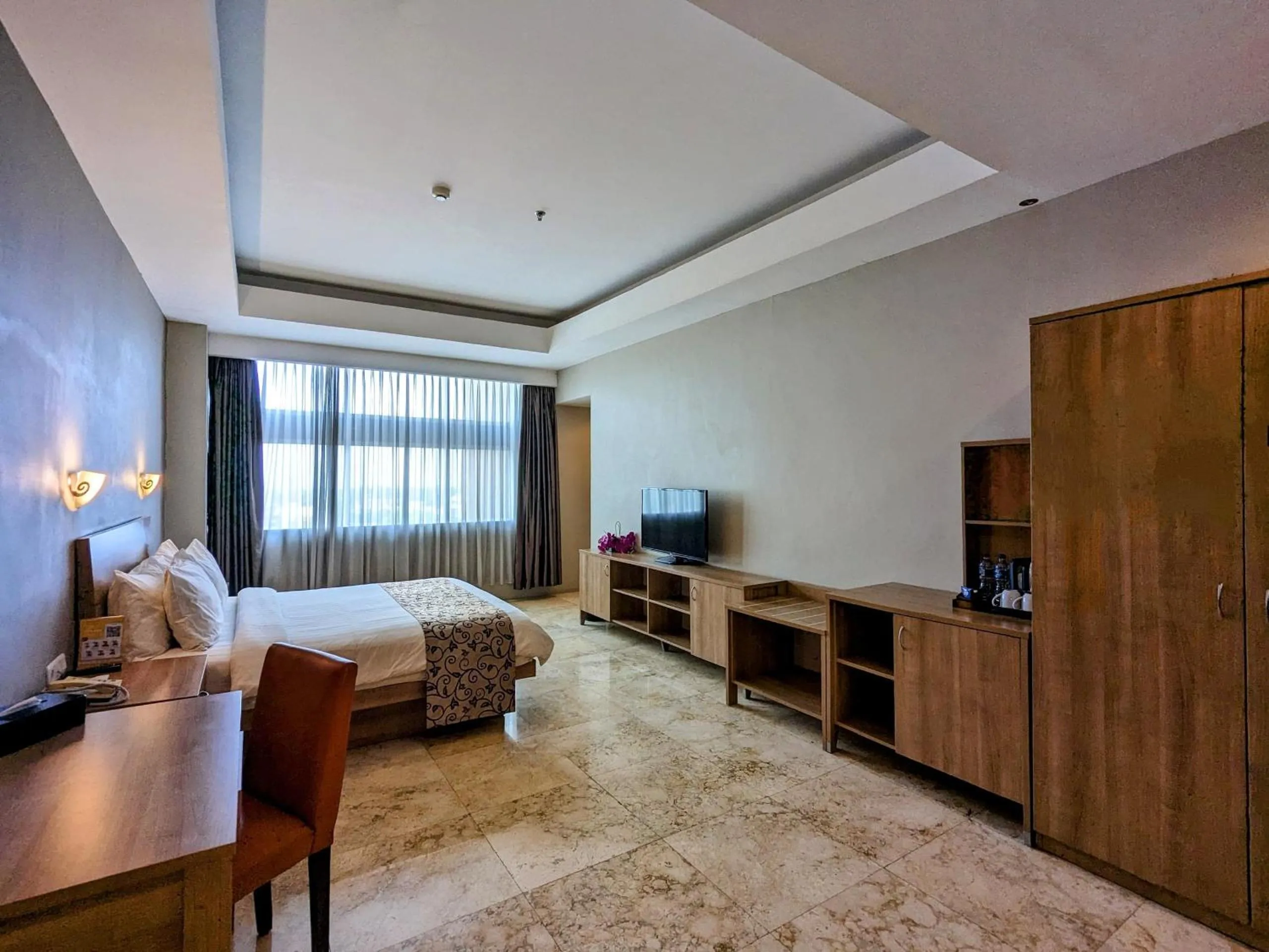 Photo of the whole room in Grand Zuri Pematangsiantar