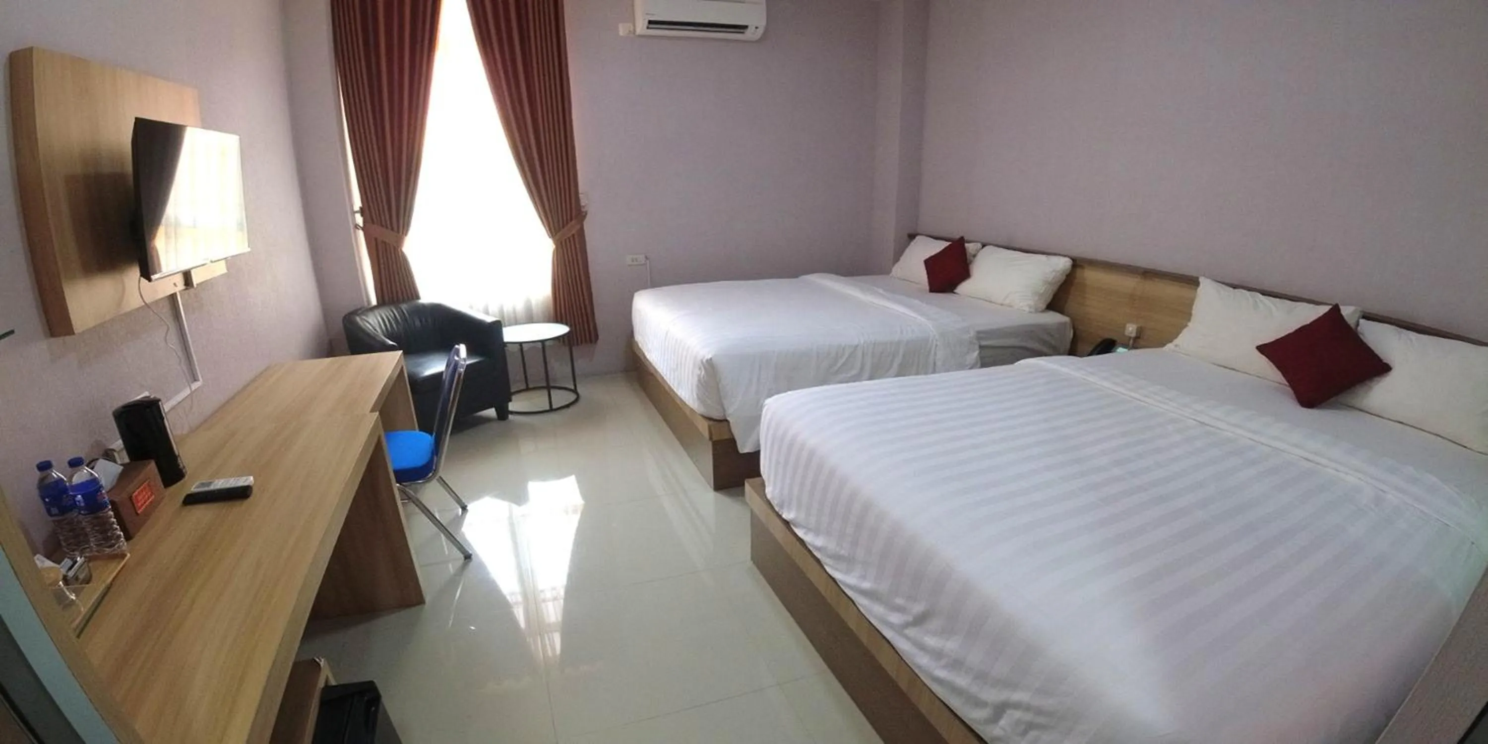 Bed in Great Cokro Edotel Lampung