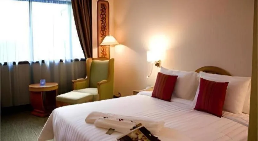 Bed in The CentrePoint Hotel