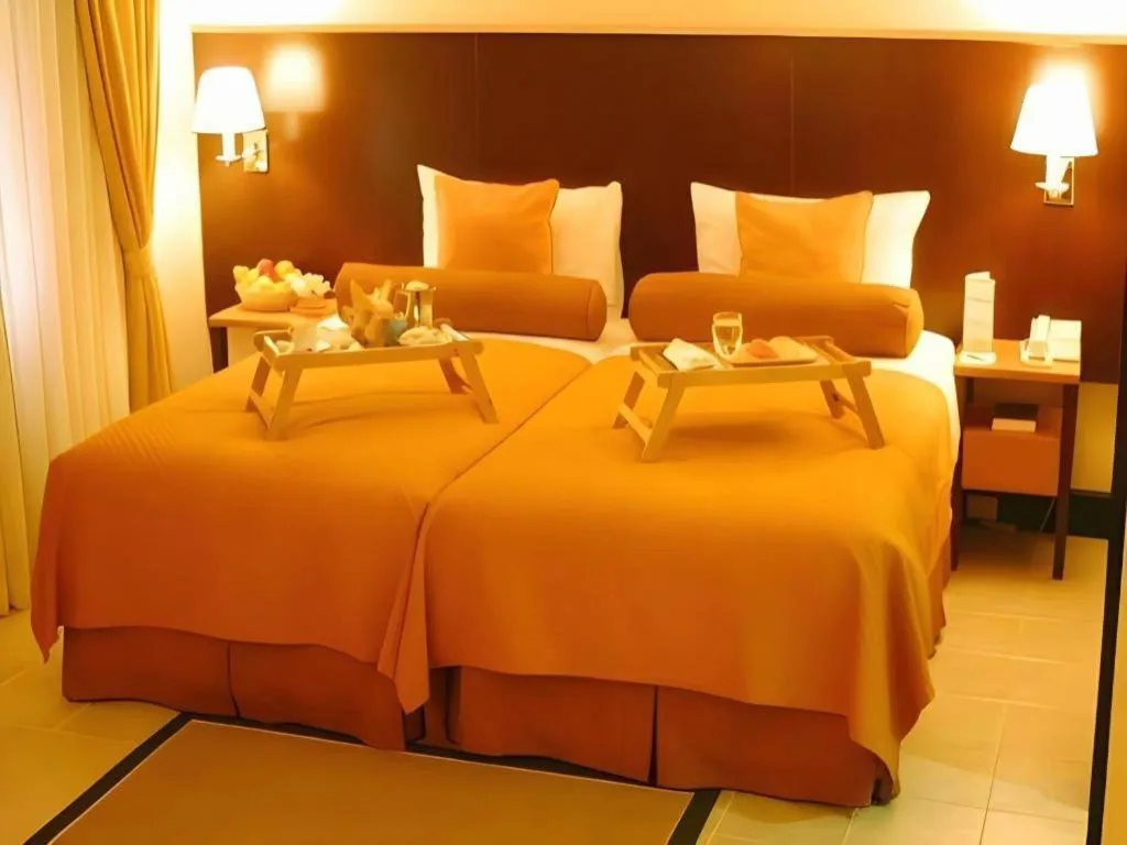Bed in Pontefino Hotel and Residences