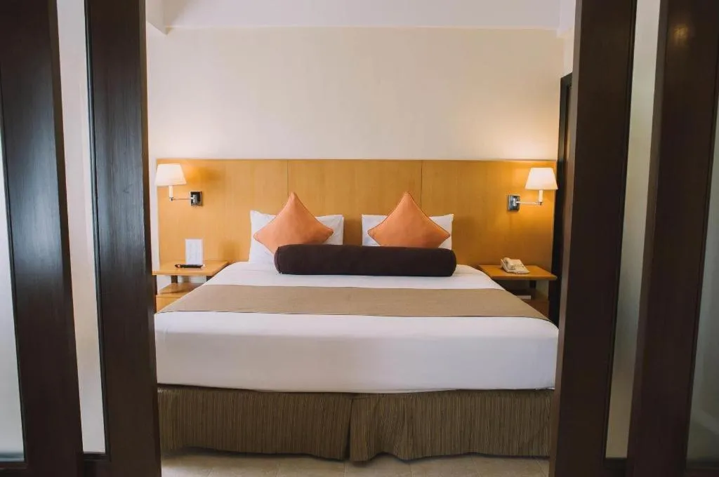 Bed in Pontefino Hotel and Residences