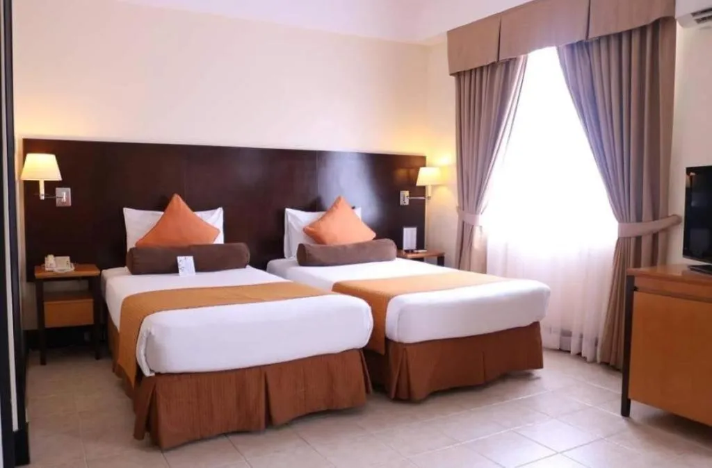 Bed in Pontefino Hotel and Residences