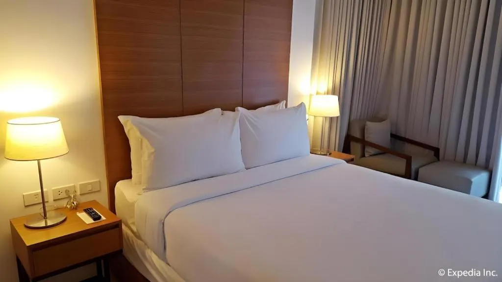 Bed in Pontefino Hotel and Residences