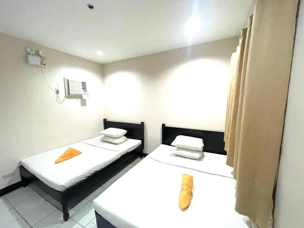 Bed in Boracay Travelodge Beach Resort