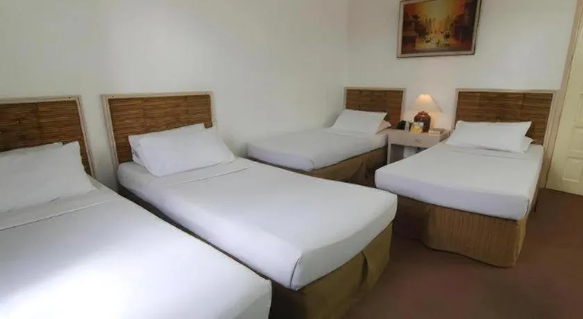 Bed in Hotel Supreme