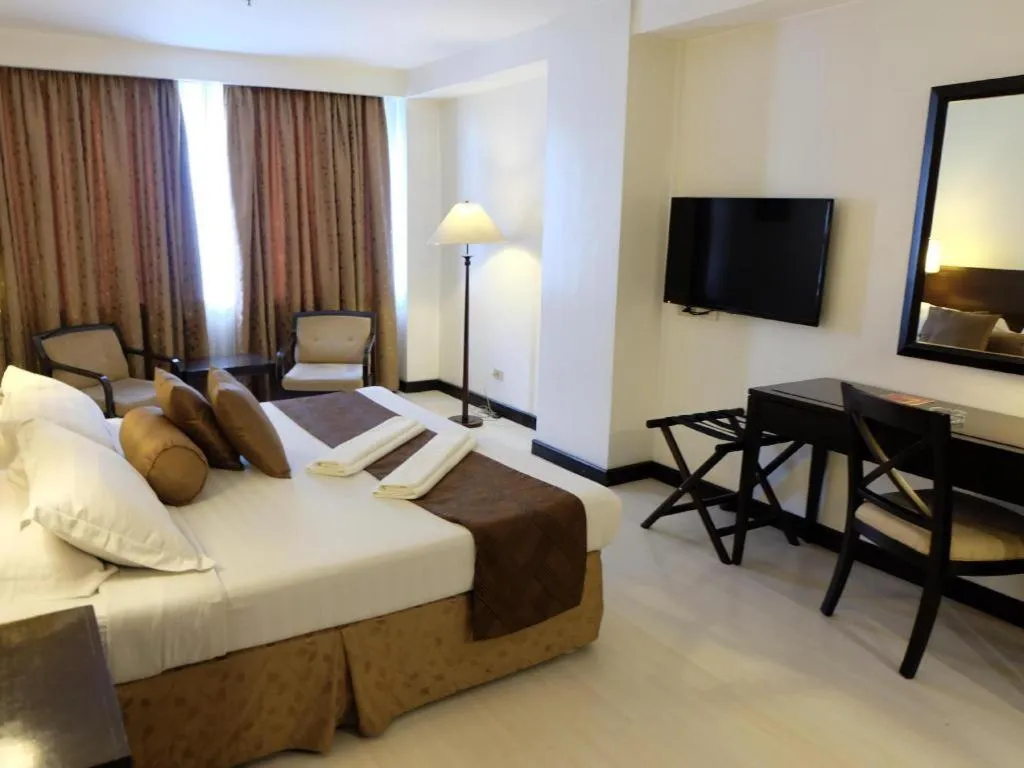 Bed in Hotel Supreme Convention Plaza