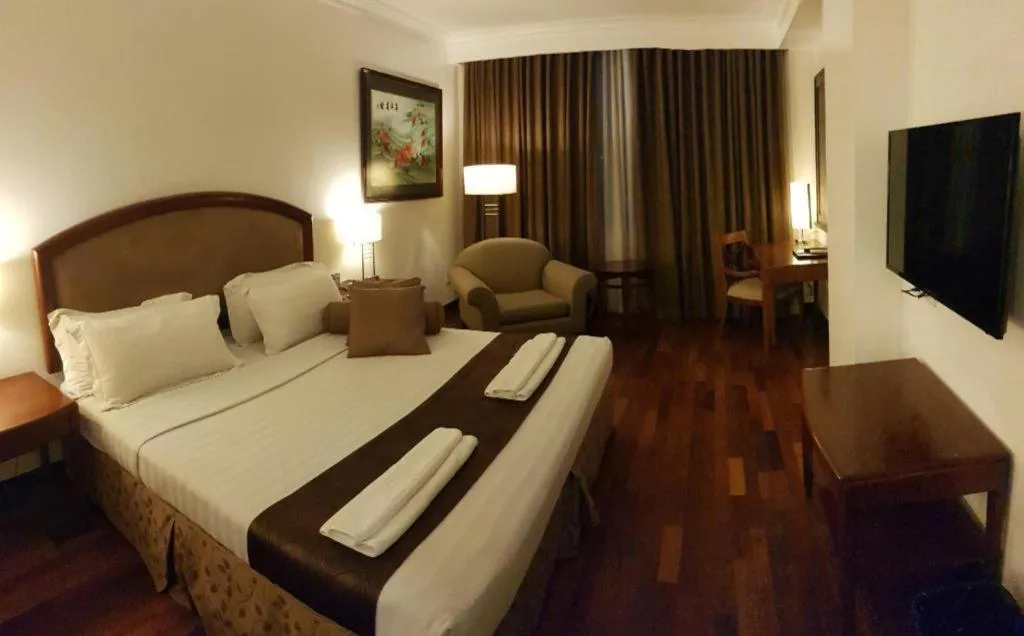 Bed in Hotel Supreme Convention Plaza