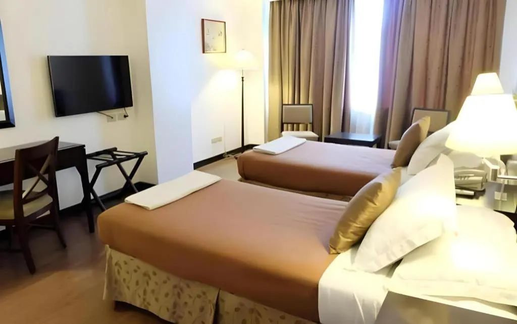 Bed in Hotel Supreme Convention Plaza