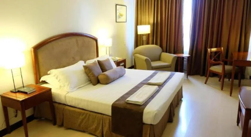 Bed in Hotel Supreme Convention Plaza