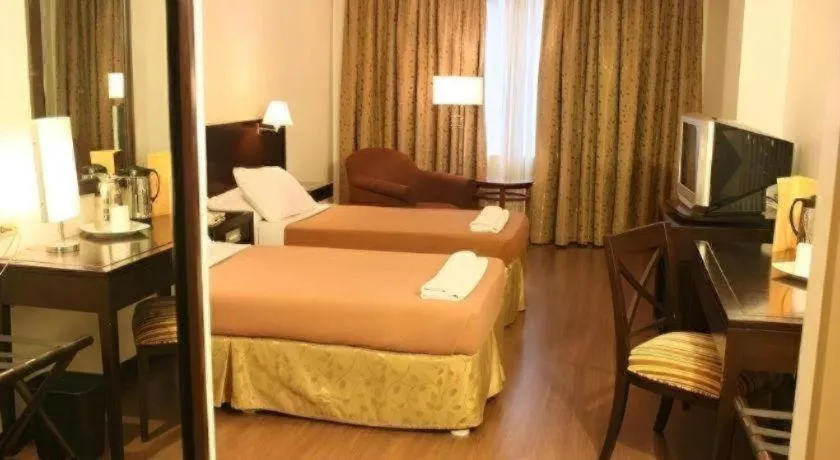 Bed in Hotel Supreme Convention Plaza