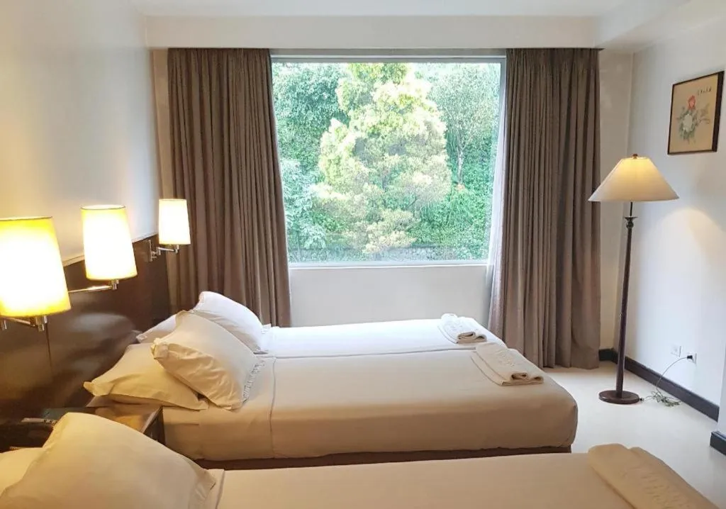 Bed in Hotel Supreme Convention Plaza