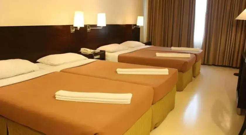 Bed in Hotel Supreme Convention Plaza Bed in Hotel Supreme Convention Plaza