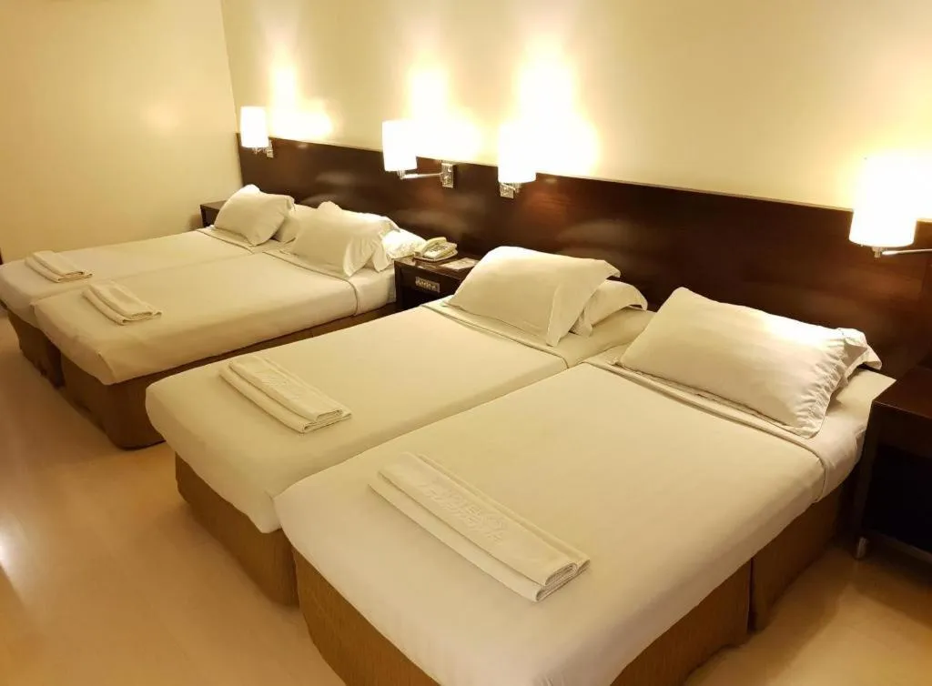 Bed in Hotel Supreme Convention Plaza