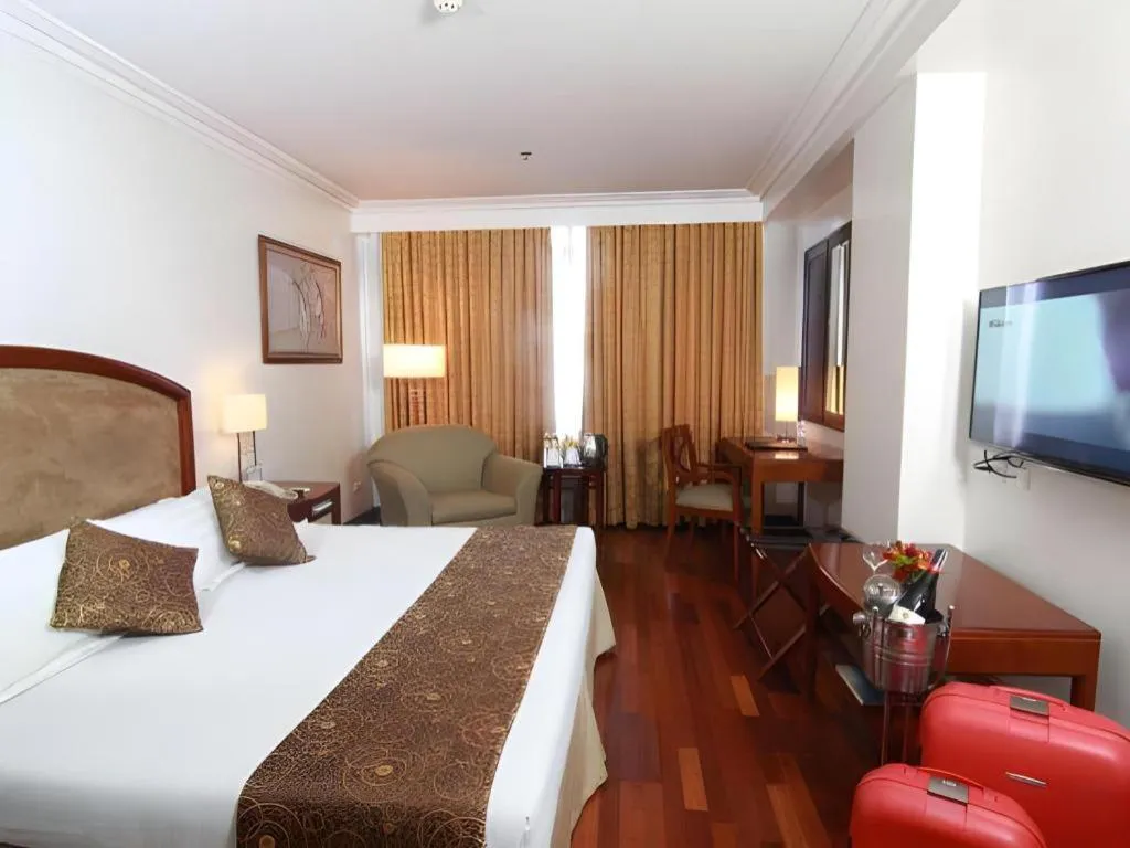 Bed in Hotel Supreme Convention Plaza