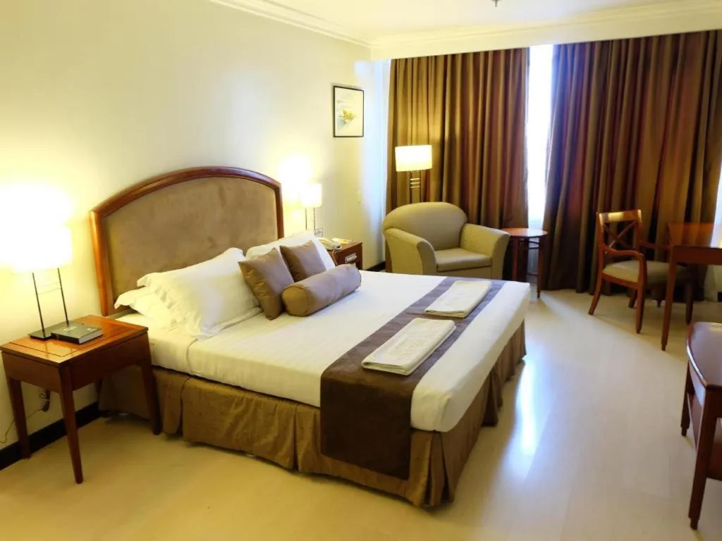 Bed in Hotel Supreme Convention Plaza