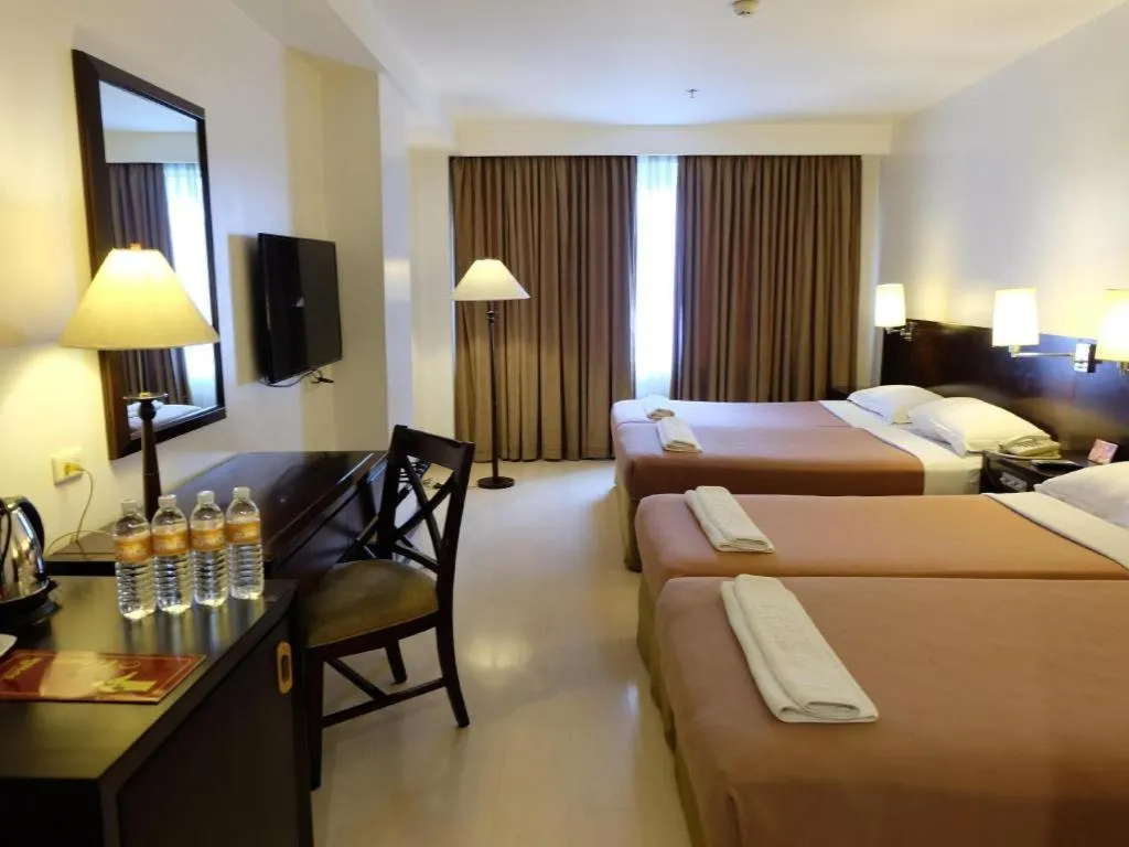 Bed in Hotel Supreme Convention Plaza