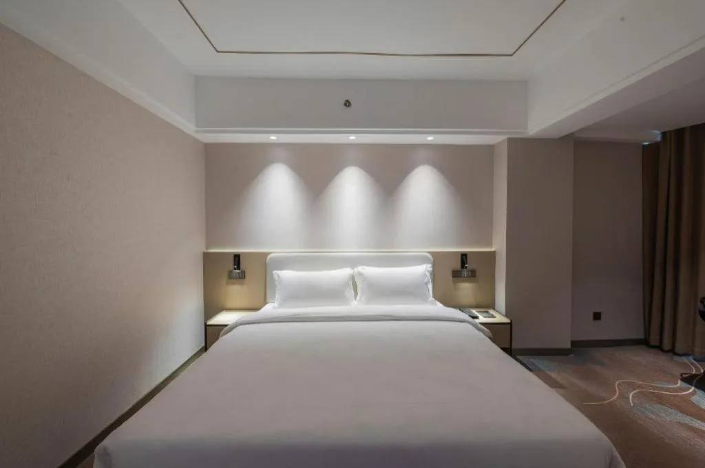 Bed in Xian Empress Hotel