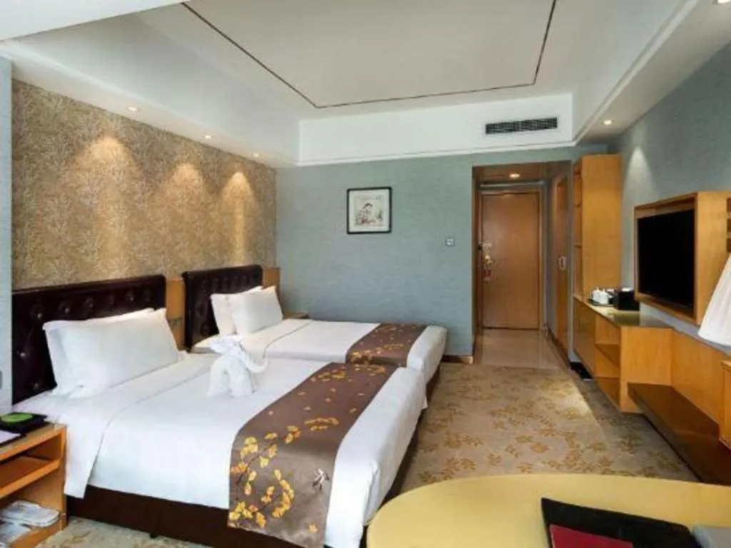 Bed in Xian Empress Hotel