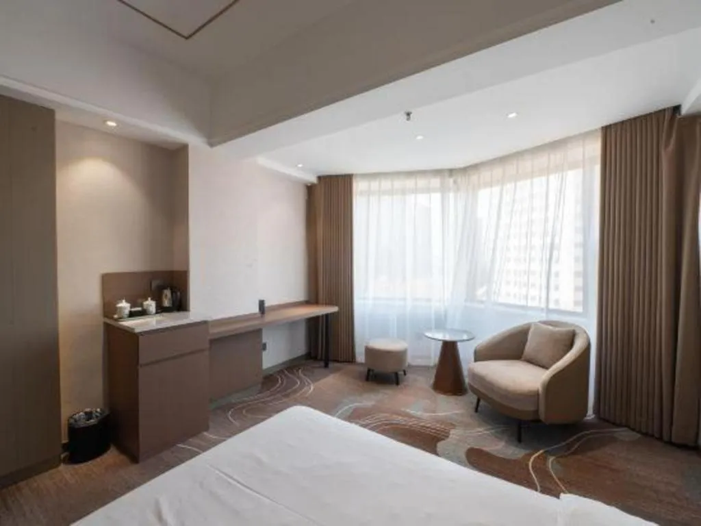 Bed in Xian Empress Hotel