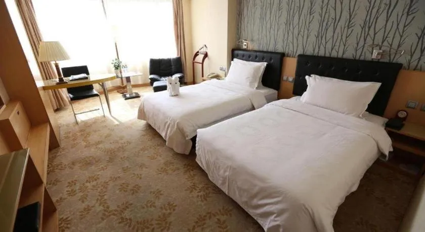 Bed in Xian Empress Hotel