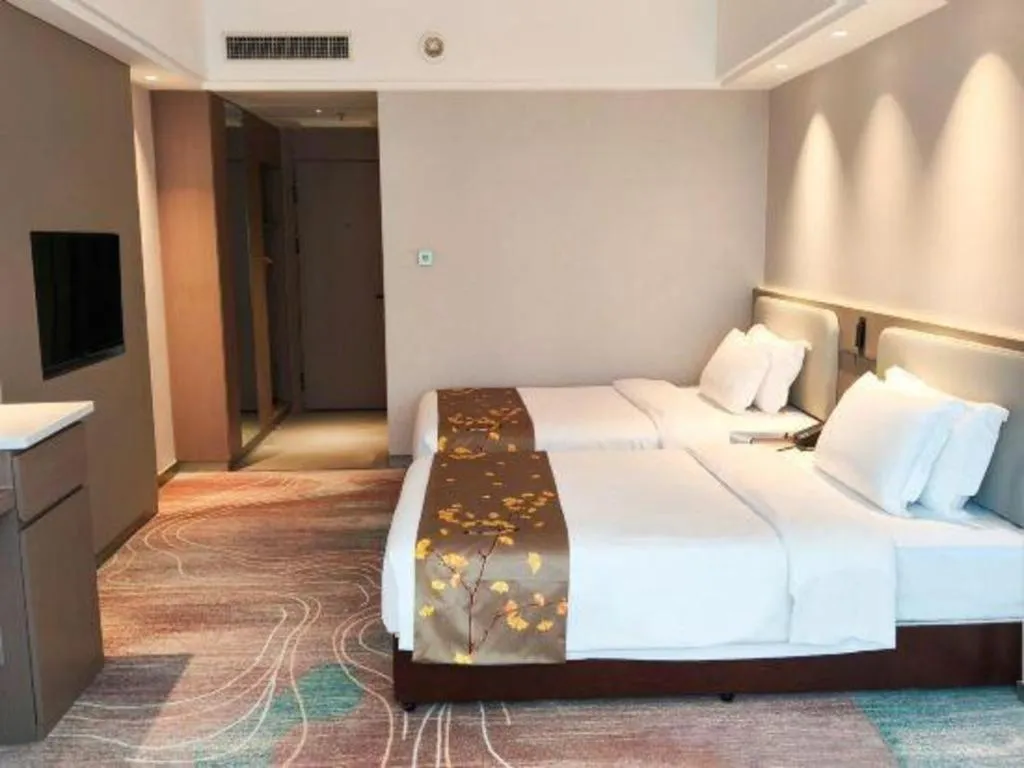 Bed in Xian Empress Hotel