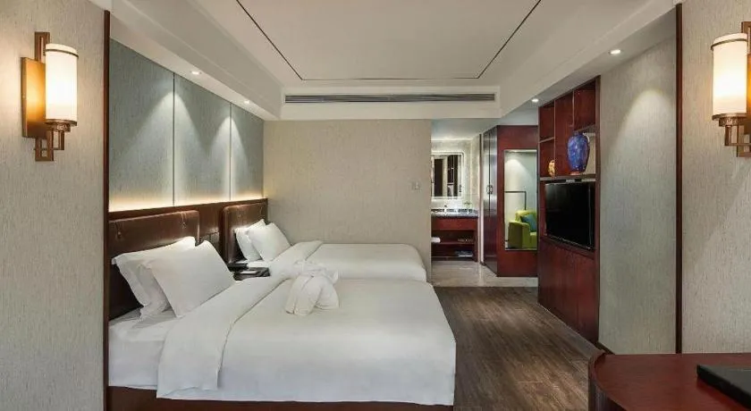 Bed in Xian Empress Hotel