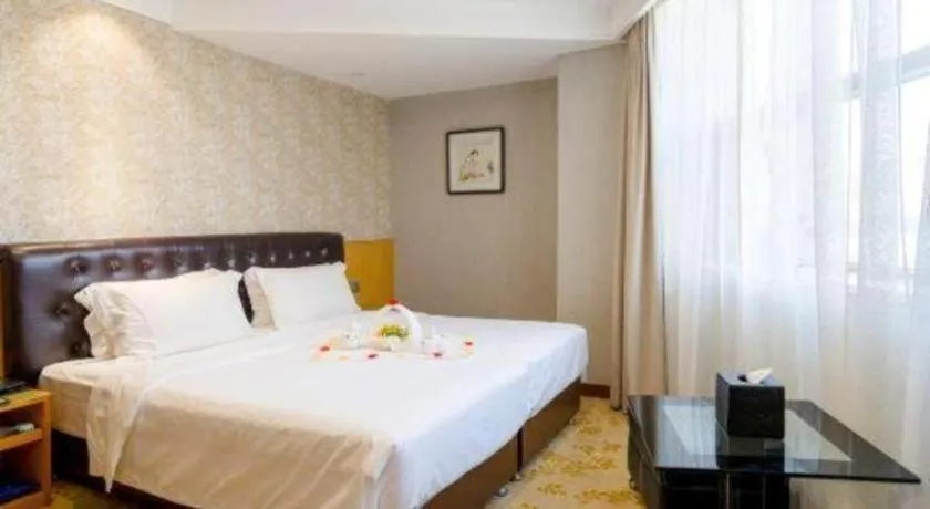 Bed in Xian Empress Hotel