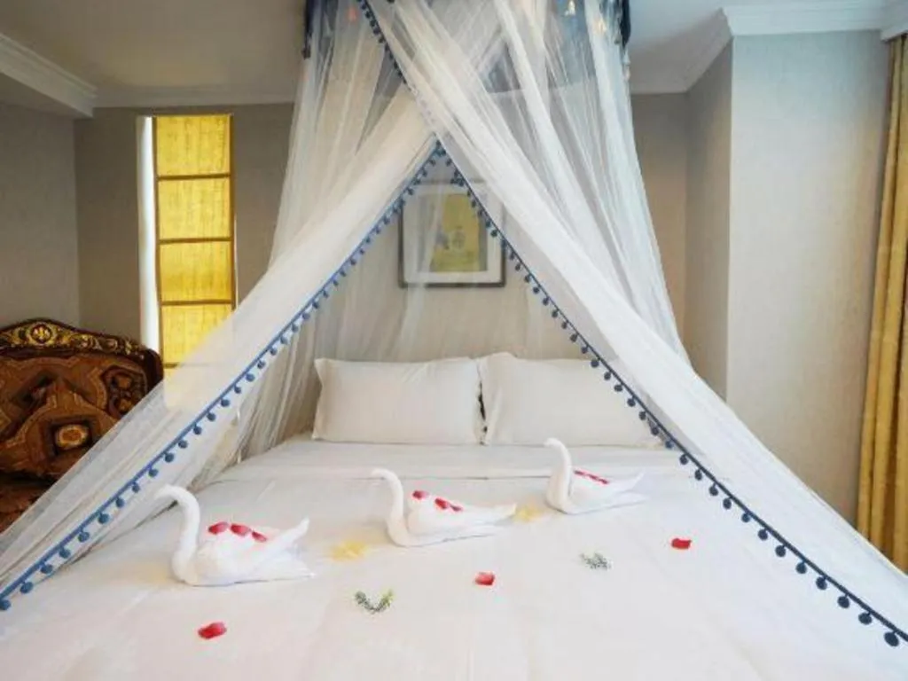 Bed in Xian Empress Hotel