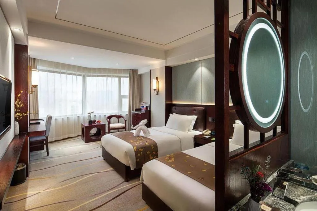 Bed in Xian Empress Hotel