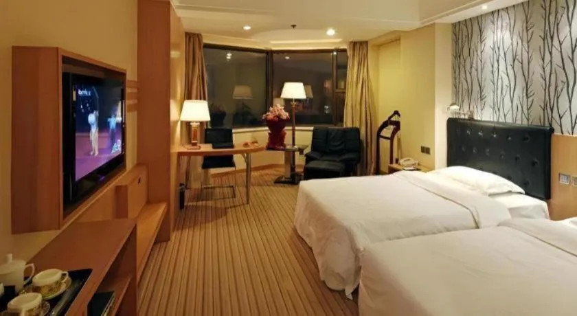 Bed in Xian Empress Hotel