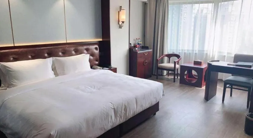 Bed in Xian Empress Hotel